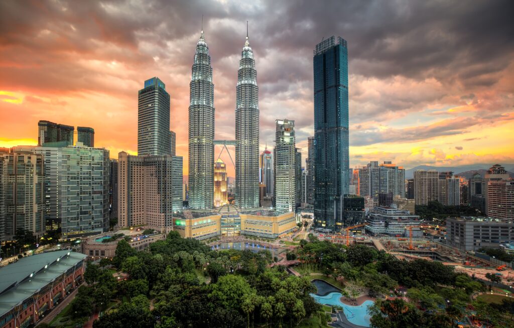 petronas twin towers lit up under a kuala lumpur s 2024 09 22 20 28 03 utc