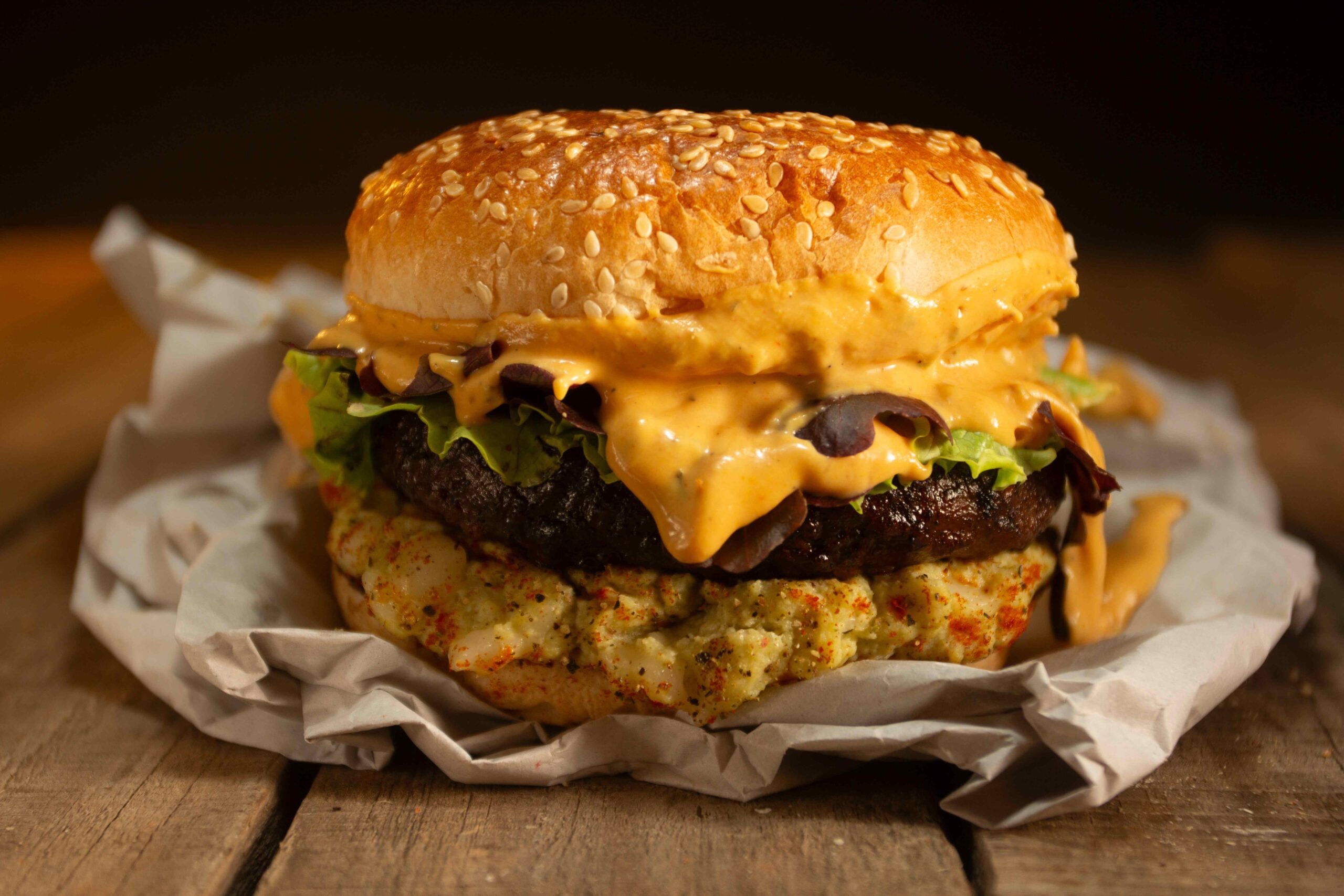 rustic hamburger with cheese and lettuce