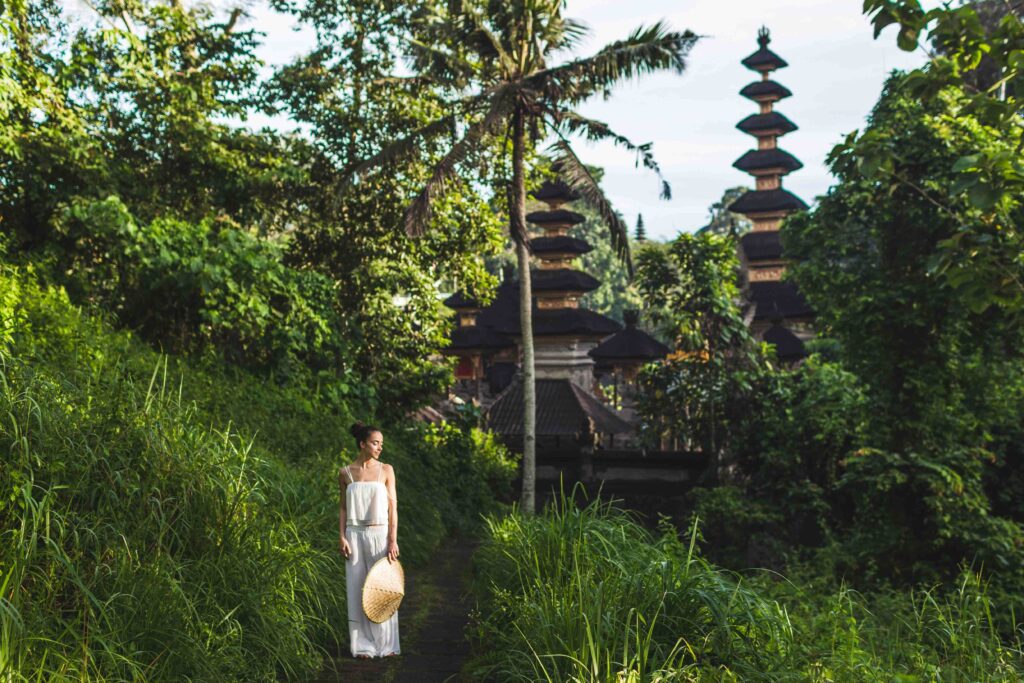 Young beautiful woman walking on Campuhan Ridge way of artists,