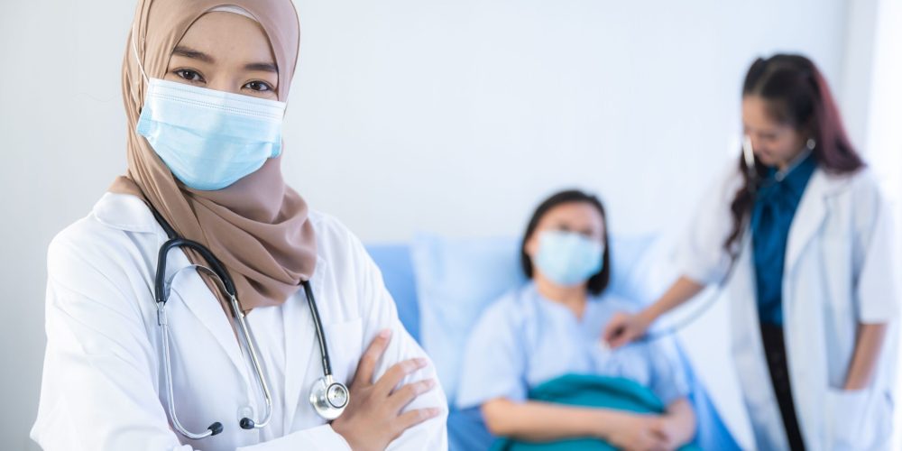 muslim asian woman doctor, Professional muslim doctor working in hospital, healthcare and medicine